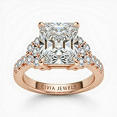 Rose Gold Radiant Cut Engagement Ring With Diamond Cluster Side Accents And Pavé Band