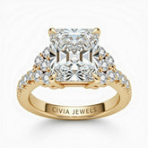 Yellow Gold Radiant Cut Engagement Ring With Diamond Cluster Side Accents And Pavé Band