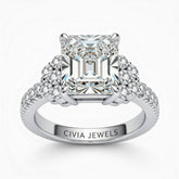 Silver Radiant Cut Engagement Ring With Diamond Cluster Side Accents And Pavé Band
