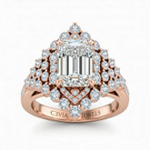Rose Gold Emerald Cut Engagement Ring With Diamond Cluster Sides, Double Halo Frame And Pavé Shank