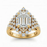 Yellow Gold Emerald Cut Engagement Ring With Diamond Cluster Sides, Double Halo Frame And Pavé Shank