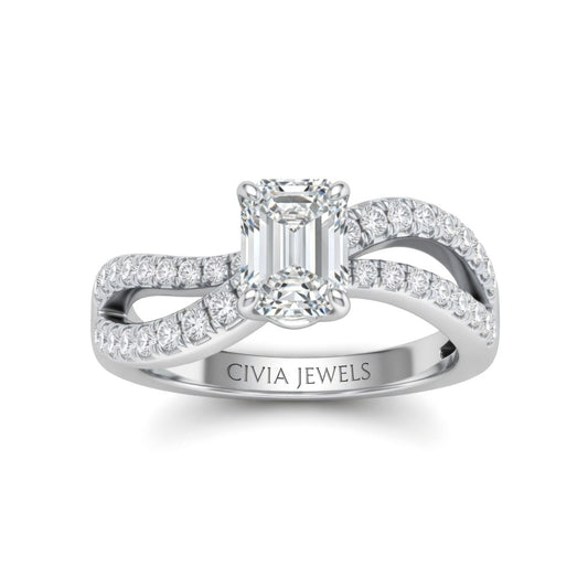 White Gold Emerald Diamond Twisted Shank Engagement Ring With Four Prong Setting And Pavé Band