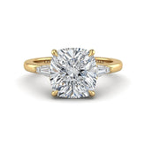 Yellow Gold Cushion Cut Three Stone Engagement Ring With Tapered Baguette Side Diamonds And Classic Four Prong Setting