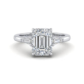 Silver Emerald Cut Three Stone Engagement Ring With Tapered Baguette Side Diamonds And Classic Four Prong Setting