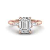 Rose Gold Emerald Cut Three Stone Engagement Ring With Tapered Baguette Side Diamonds And Classic Four Prong Setting