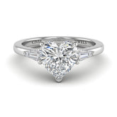Silver Heart Cut Three Stone Engagement Ring With Tapered Baguette Side Diamonds And Classic Four Prong Setting