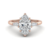 Rose Gold Marquise Cut Three Stone Engagement Ring With Tapered Baguette Side Diamonds And Classic Four Prong Setting