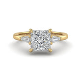 Yellow Gold Princess Cut Three Stone Engagement Ring With Tapered Baguette Side Diamonds And Classic Four Prong Setting