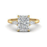 Yellow Gold Radiant Cut Three Stone Engagement Ring With Tapered Baguette Side Diamonds And Classic Four Prong Setting