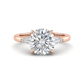 Rose Gold Round Cut Three Stone Engagement Ring With Tapered Baguette Side Diamonds And Classic Four Prong Setting