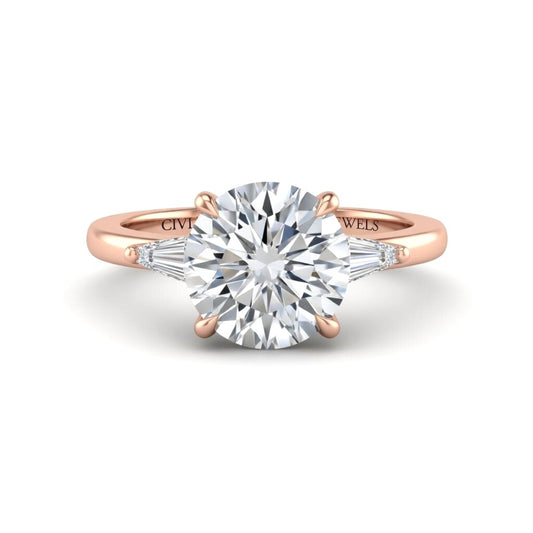 Rose Gold Round Cut Three Stone Engagement Ring With Tapered Baguette Side Diamonds And Classic Four Prong Setting