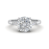White Gold Round Cut Three Stone Engagement Ring With Tapered Baguette Side Diamonds And Classic Four Prong Setting