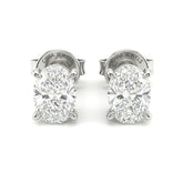 White Gold Oval Cut Diamond Stud Earrings With Four Prong Setting