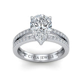 White Gold Pear Cut Double Row Pavé Split Band Engagement Ring With Classic Four Prong Solitaire Setting