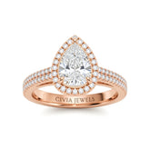 Rose Gold Pear Cut Diamond Halo Engagement Ring With Four Prong Setting And Pavé Band