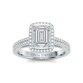 White Gold Emerald Cut Diamond Halo Engagement Ring With Four Prong Setting And Pavé Band