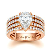 Rose Gold Pear Diamond Engagement Ring With Multirow Pavé Band