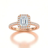Rose Gold Emerald Diamond Halo Engagement Ring With Pavé Band Design
