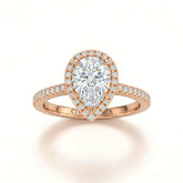 Rose Gold Pear Diamond Halo Engagement Ring With Pavé Band Design