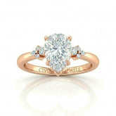 Rose Gold Pear Diamond Engagement Ring With Floral Cluster Side Design