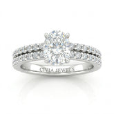 White Gold Oval Diamond Engagement Ring With Split Pavé Band Design