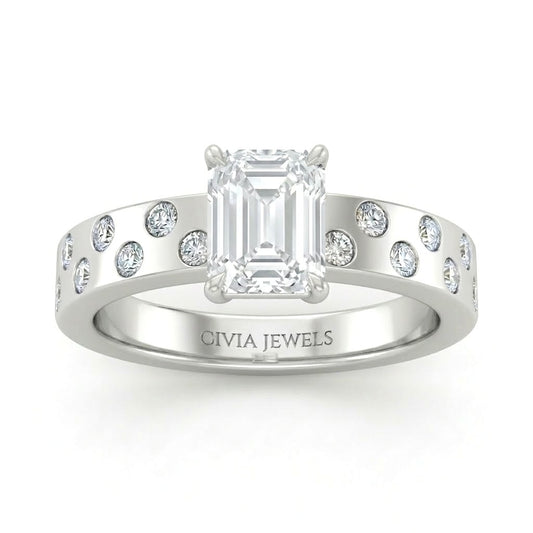 White Gold Emerald Diamond Scattered Engagement Ring With Flush Set Accent Band
