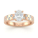 Rose Gold Oval Diamond Scattered Engagement Ring With Flush Set Accent Band