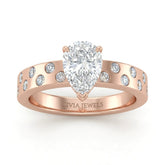 Rose Gold Pear Diamond Scattered Engagement Ring With Flush Set Accent Band