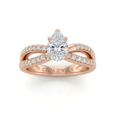 Rose Gold Pear Diamond Bypass Engagement Ring With Pavé Crossover Band