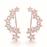 Rose gold Star Cluster Diamond Crescent Earrings with Round Cut Stones on a Curved Band and Prong Setting