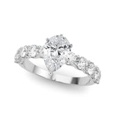 Silver Pear Diamond Prong Setting with Side Stones on a Pave Band