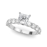 Silver Princess Diamond Prong Setting with Side Stones on a Pave Band
