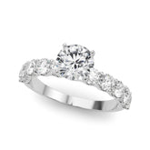 Silver Round Diamond Prong Setting with Side Stones on a Pave Band