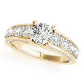 Yellow gold Round Brilliant Channel-Set Diamond Engagement Ring with Split Shank and Four-Prong Setting