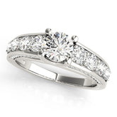 Platinum Round Brilliant Channel-Set Diamond Engagement Ring with Split Shank and Four-Prong Setting