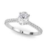 Silver Oval Cut Solitaire Diamond Engagement Ring with Pave Band and Four-Prong Setting