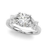 White gold Round Brilliant Diamond Floral Cluster Solitaire with Marquise and Pear Accents on a Platinum Band with Four-Prong Setting