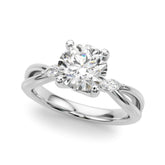 White gold Round Brilliant Diamond Solitaire with Marquise Side Stones on a Twisted Band and Four-Prong Setting