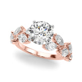 Rose gold Round Brilliant Diamond Solitaire with Marquise and Pear Accent Stones on a Split Shank Band with Four-Prong Setting