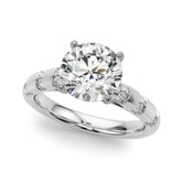 White gold Round Solitaire Diamond Ring with Channel Set Band and Four-Prong Setting
