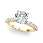 Yellow gold Round Brilliant Solitaire with Pavé Band and Four-Prong Setting