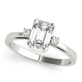 White gold Oval Cut Three-Stone Solitaire Ring with Round Accent Diamonds and Four-Prong Setting