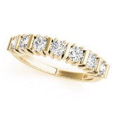 Yellow gold Channel Set Round Diamond Eternity Band with Bar Prong Setting