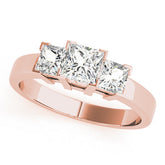 Rose gold Three-Stone Princess Cut Diamond Ring with Channel Band and Prong Setting