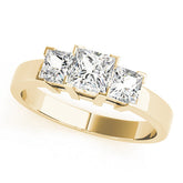 Yellow gold Three-Stone Princess Cut Diamond Ring with Channel Band and Prong Setting