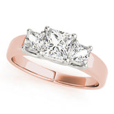 Rose gold Three-Stone Princess Cut Diamond Ring with Channel-Set Band and Four-Prong Setting