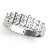 Platinum Channel Set Round Diamond Step Band with Bar Prong Setting