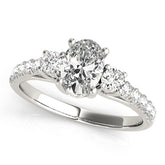 White gold Oval Cut Three-Stone Diamond Pave Band with Prong Setting