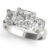 Platinum Three-Stone Princess Cut Diamond Ring with Channel Set Band and Four-Prong Setting