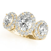 Yellow gold Three-Stone Oval Halo Diamond Ring with Pave Band and Four-Prong Setting